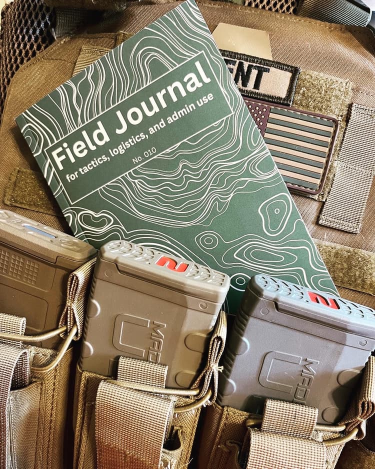 Field Journal in Admin Pouch of Plate Carrier.